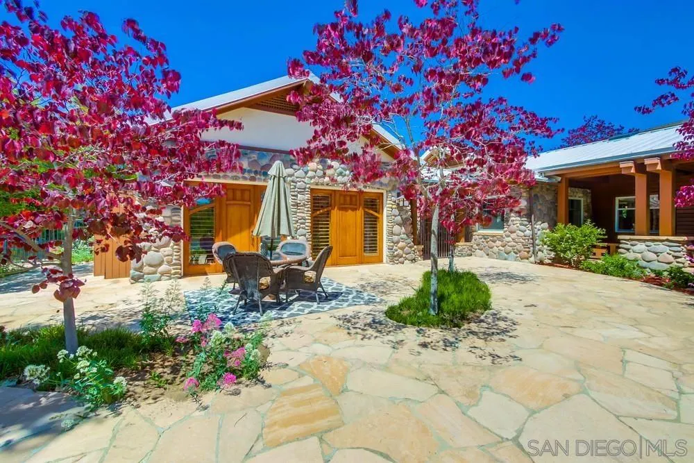 13980 Millards Ranch Lane Poway, CA 92064 - Photo 5 of 75 a front view of a house with garden