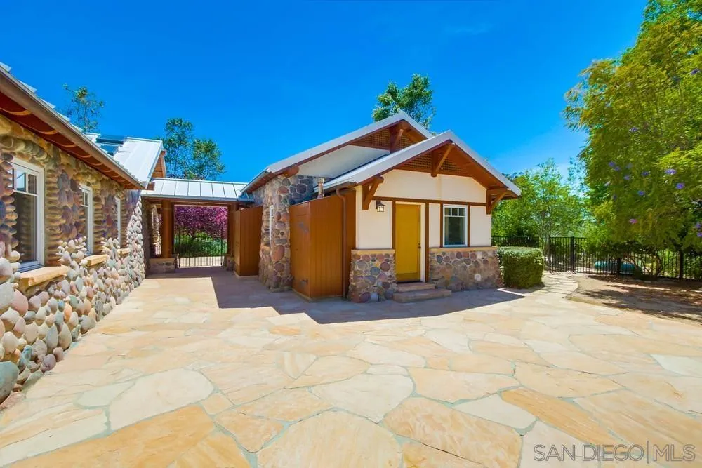 13980 Millards Ranch Lane Poway, CA 92064 - Photo 65 of 75 a view of a house with a yard