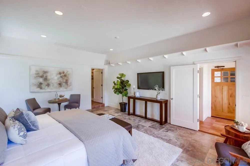 13980 Millards Ranch Lane Poway, CA 92064 - Photo 66 of 75 a bedroom with a bed and a television