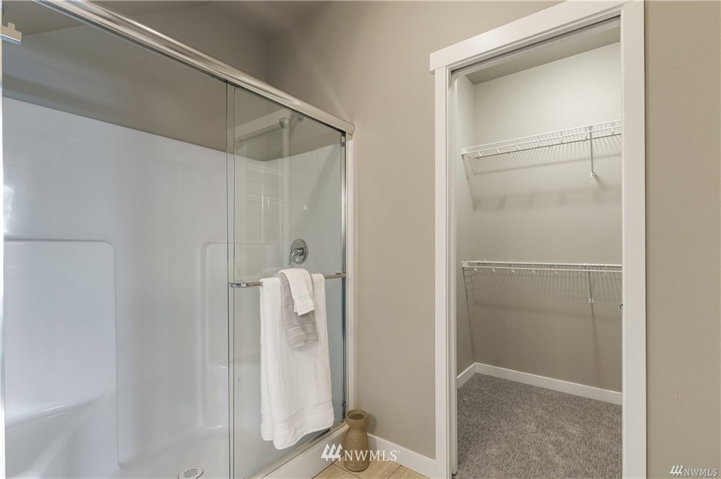 6934 Red Ridge Drive, Unit B Lynden, WA 98264 - Photo 23 of 34 a view of walk in closet with empty racks