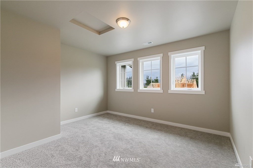 6934 Red Ridge Drive, Unit B Lynden, WA 98264 - Photo 25 of 34 an empty room with windows