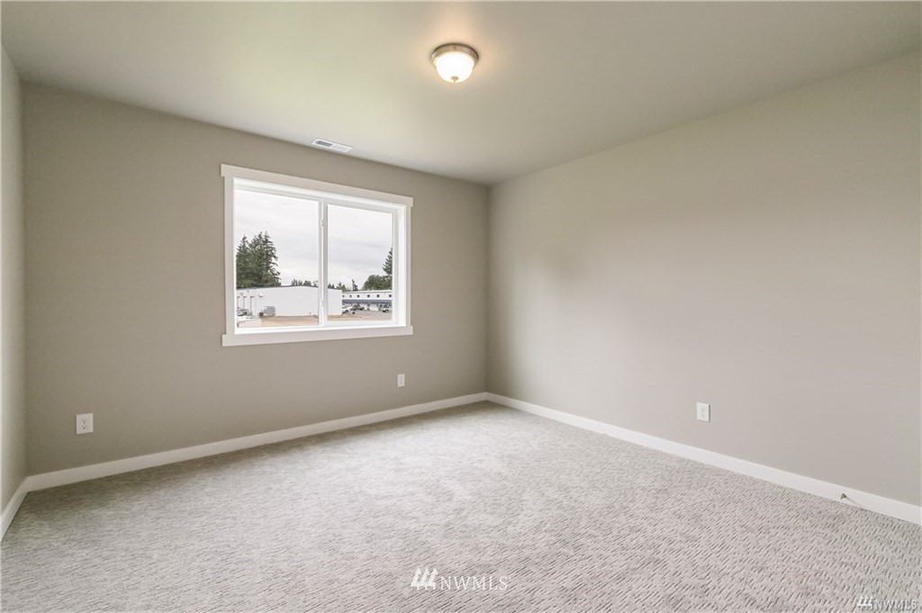 6934 Red Ridge Drive, Unit B Lynden, WA 98264 - Photo 28 of 34 an empty room with windows