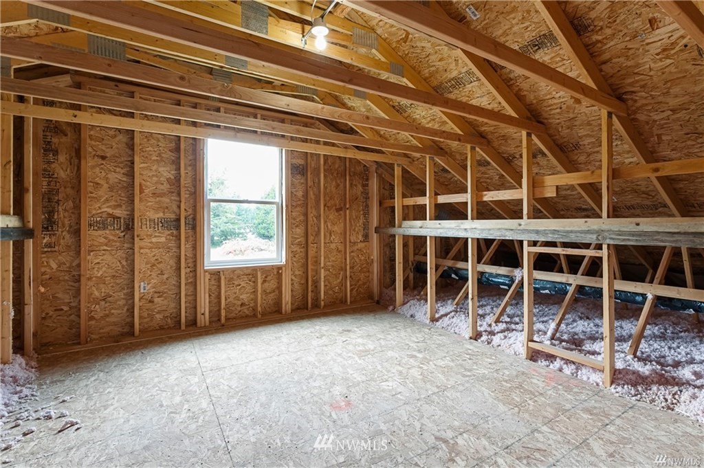 6934 Red Ridge Drive, Unit B Lynden, WA 98264 - Photo 31 of 34 a view of a room with wooden walls and window