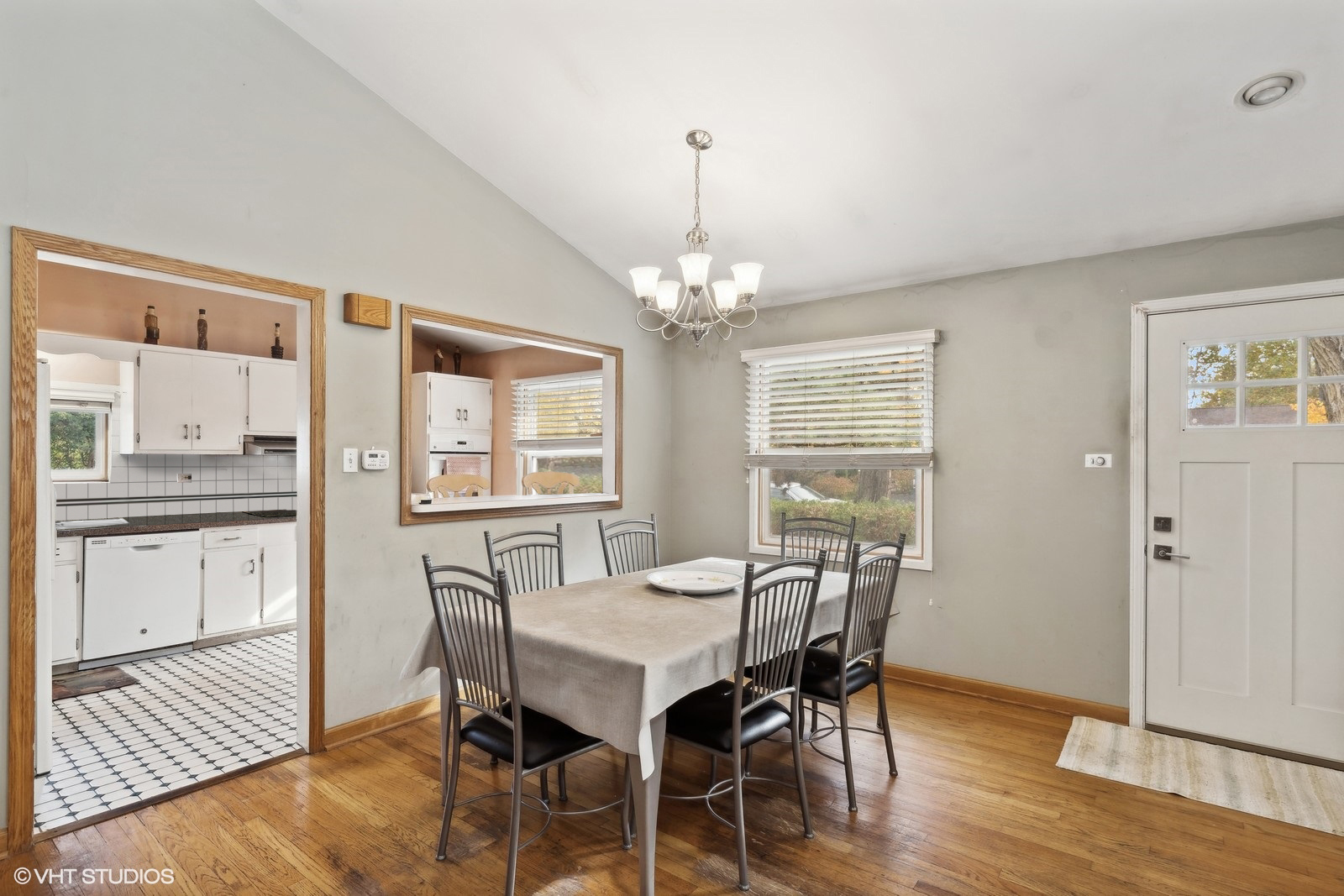 1425 Sunset Ridge Road Northbrook, IL 60062 - Photo 8 of 17 a view of a dining room with furniture window and wooden floor