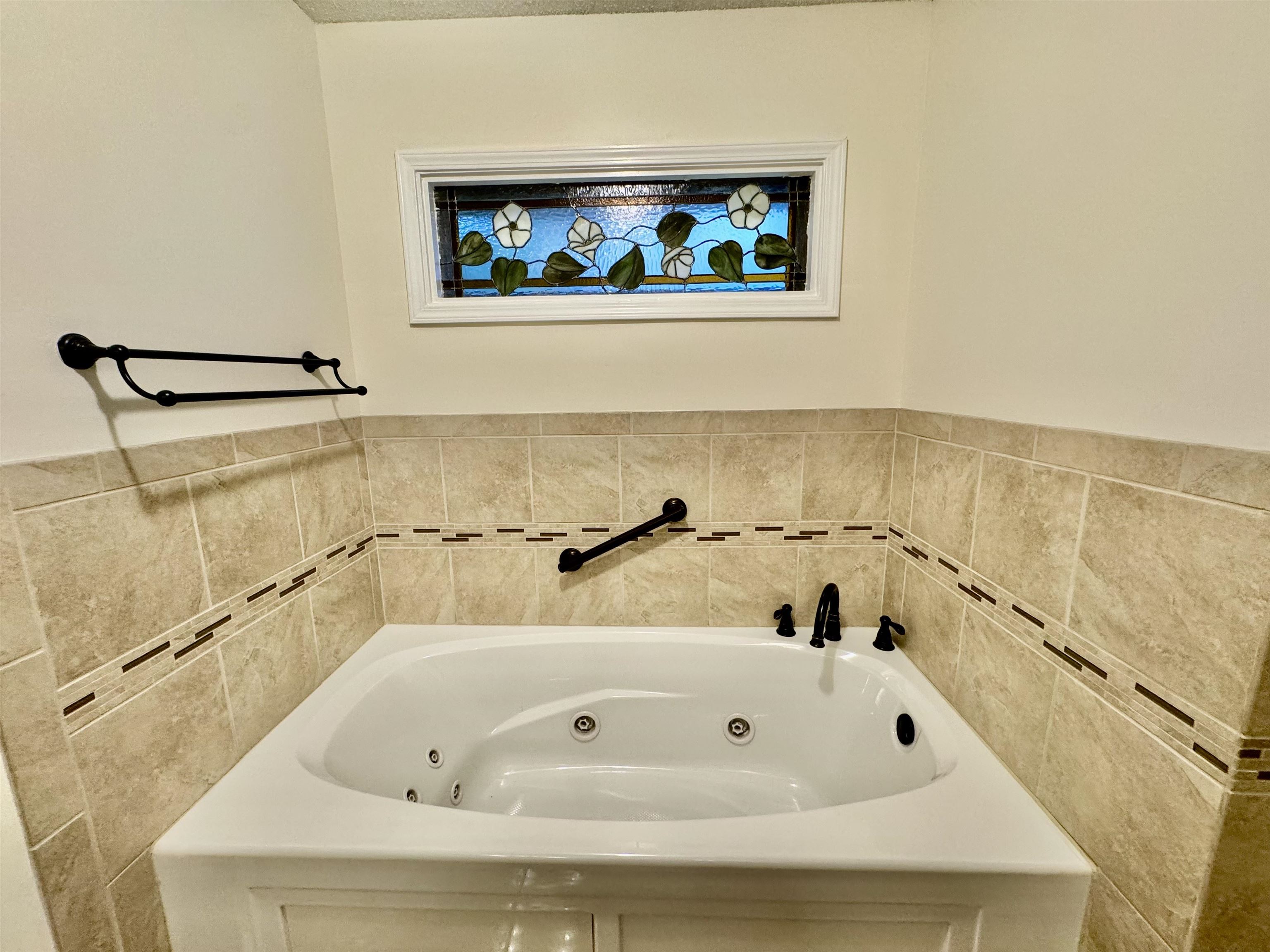 7245 Barnstable Road Memphis, TN 38125 - Photo 19 of 36 Bathroom with a washtub