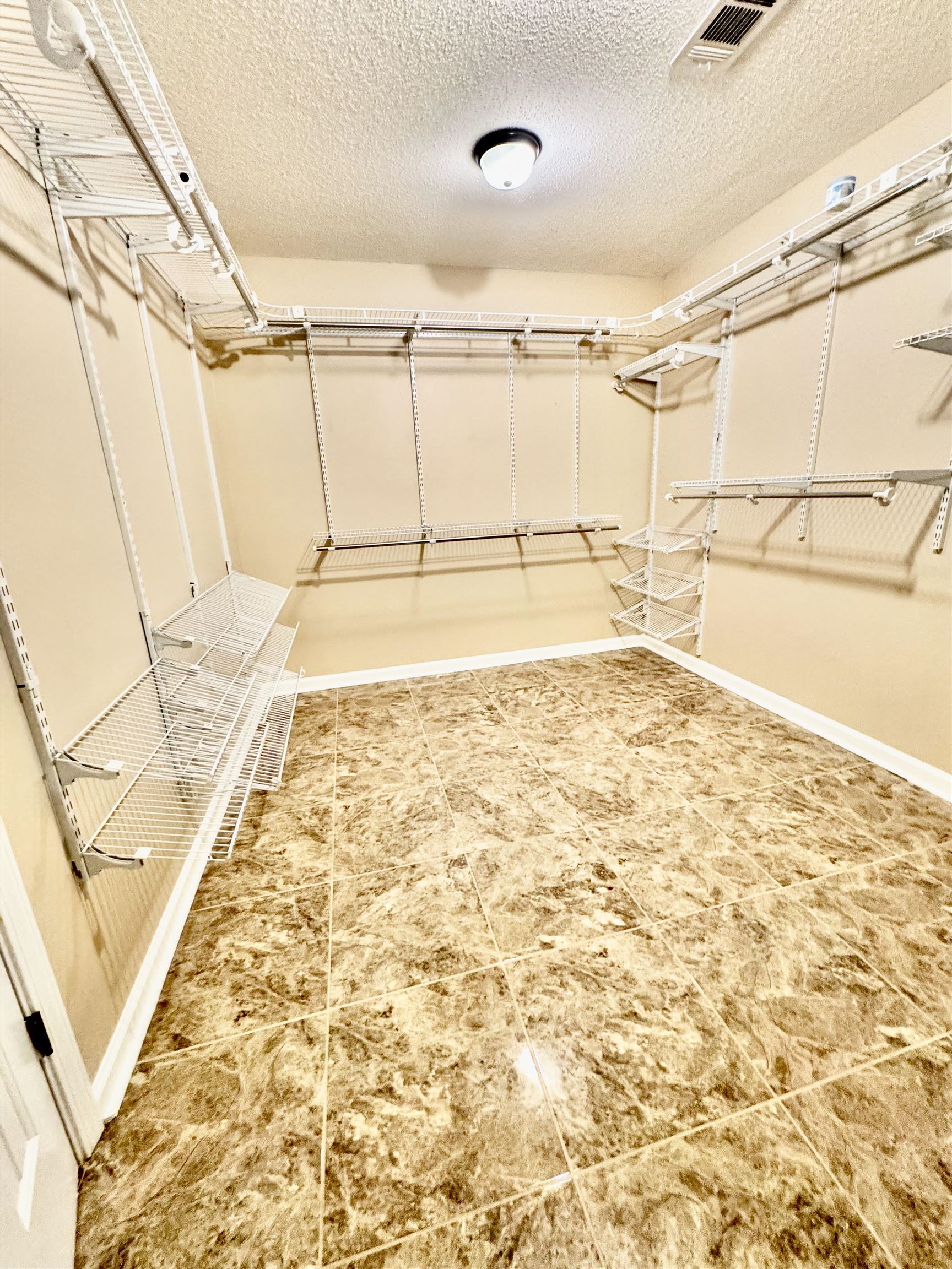 7245 Barnstable Road Memphis, TN 38125 - Photo 22 of 36 View of walk in closet