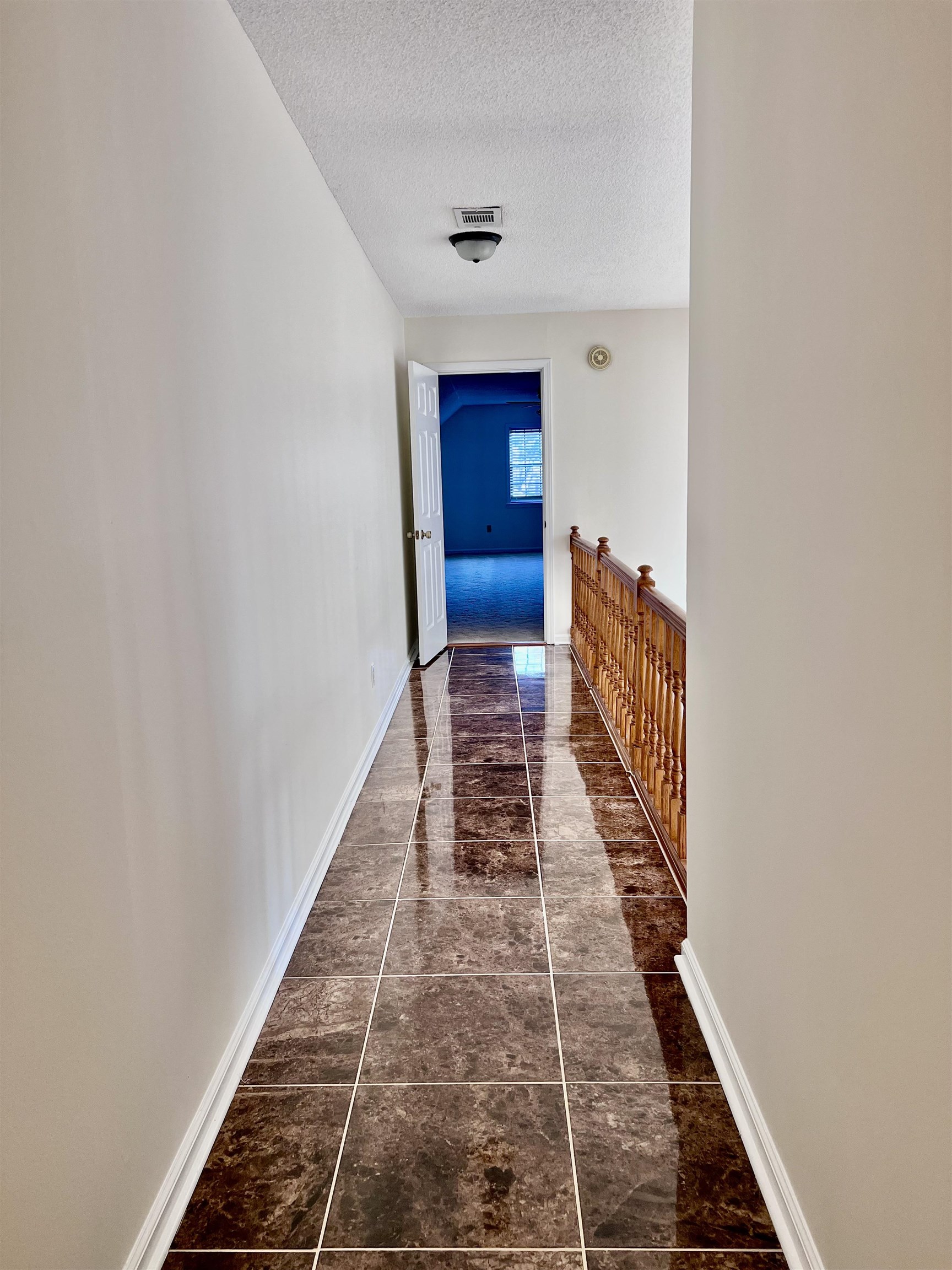7245 Barnstable Road Memphis, TN 38125 - Photo 31 of 36 Hallway with a textured ceiling