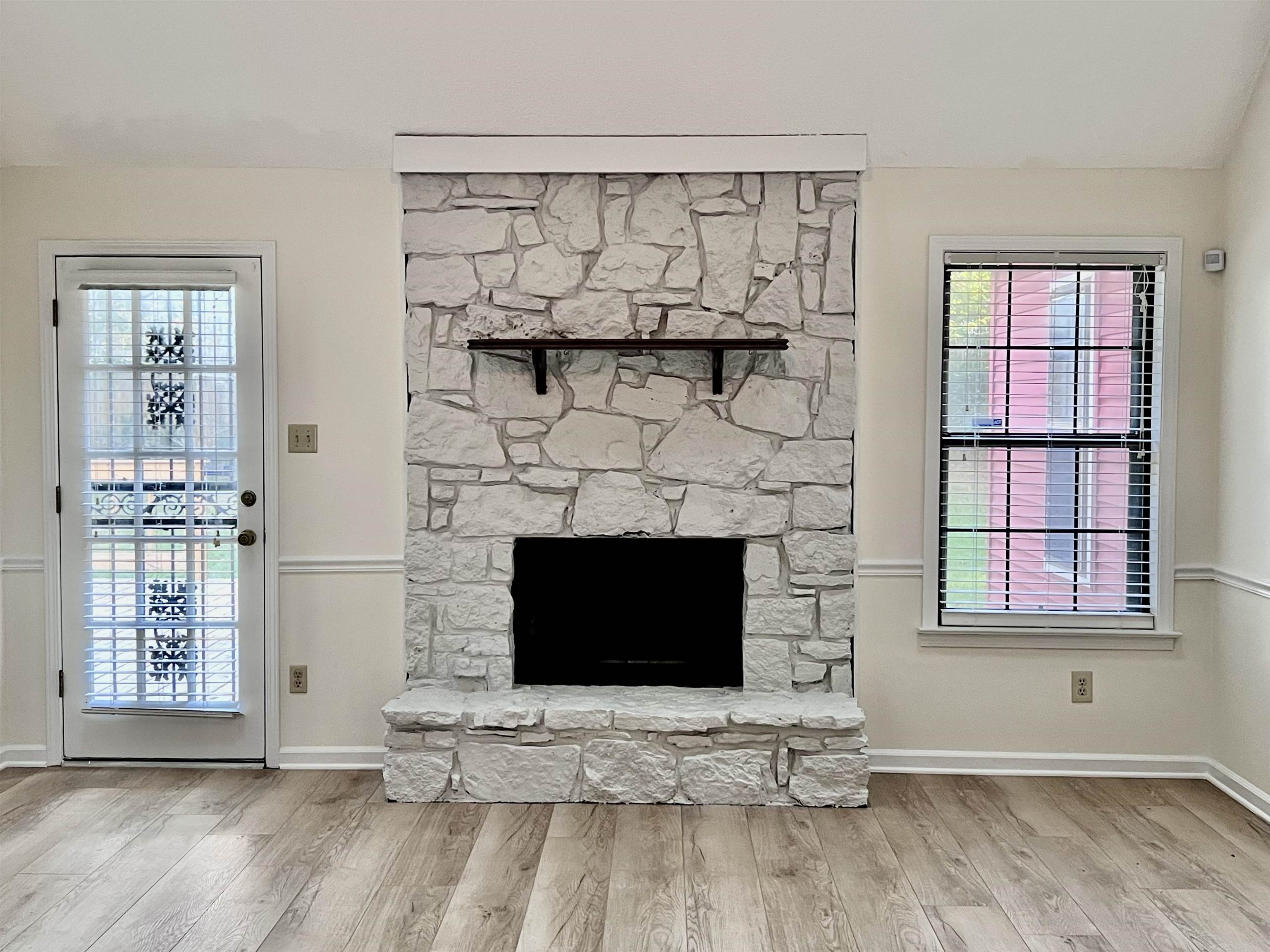 7245 Barnstable Road Memphis, TN 38125 - Photo 5 of 36 Details featuring a fireplace and hardwood / wood-style floors