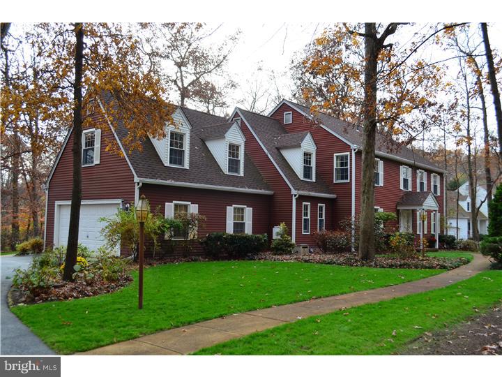 3 Kendles Run Road Moorestown, NJ 08057 - Photo 1 of 19 a front view of a house with a garden and plants