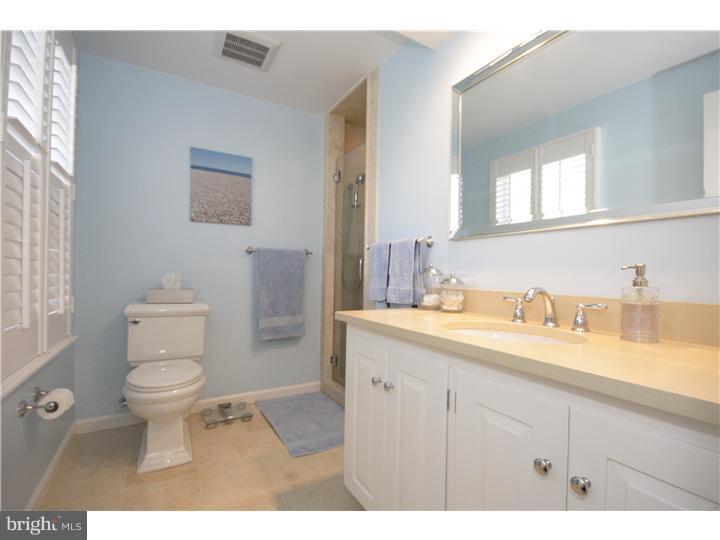 3 Kendles Run Road Moorestown, NJ 08057 - Photo 12 of 19 a bathroom with a granite countertop toilet sink and a mirror