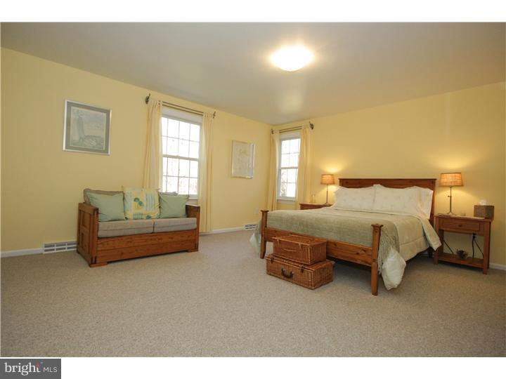 3 Kendles Run Road Moorestown, NJ 08057 - Photo 13 of 19 a spacious bedroom with a bed and a couch