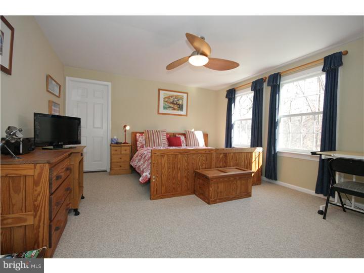 3 Kendles Run Road Moorestown, NJ 08057 - Photo 15 of 19 a living room with furniture and a flat screen tv