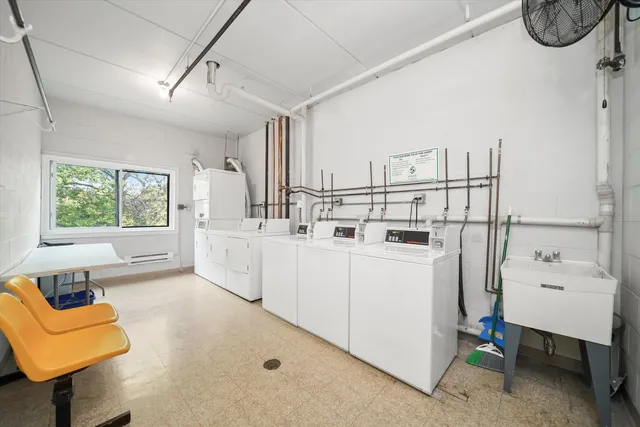 a view of a living room and kitchen