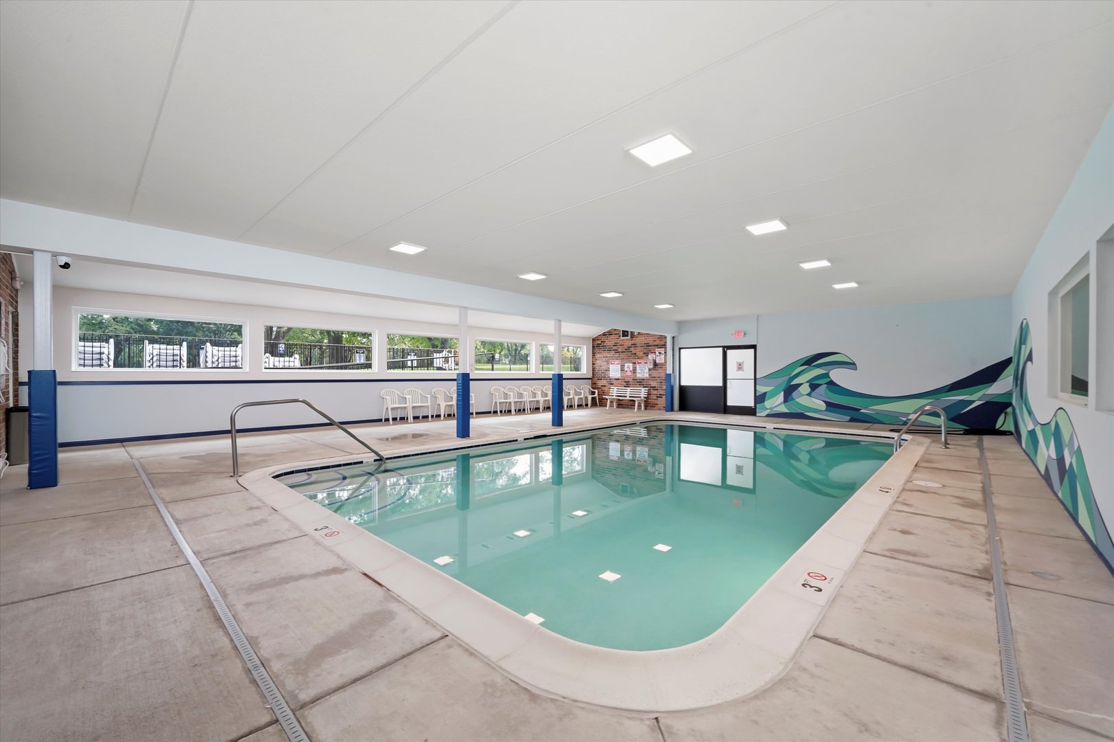 1400 North Elmhurst Road, Unit 302 Mount Prospect, IL 60056 - Photo 15 of 18 a view of a living room and kitchen