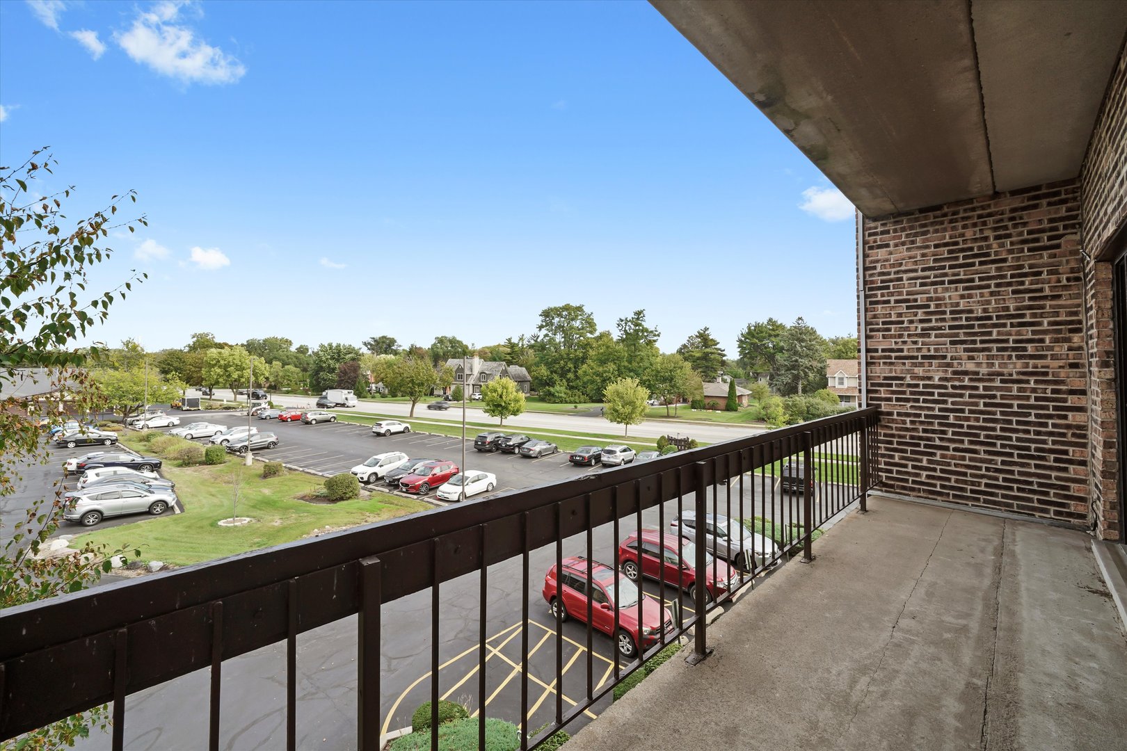 1400 North Elmhurst Road, Unit 302 Mount Prospect, IL 60056 - Photo 7 of 18 a view of city from a balcony
