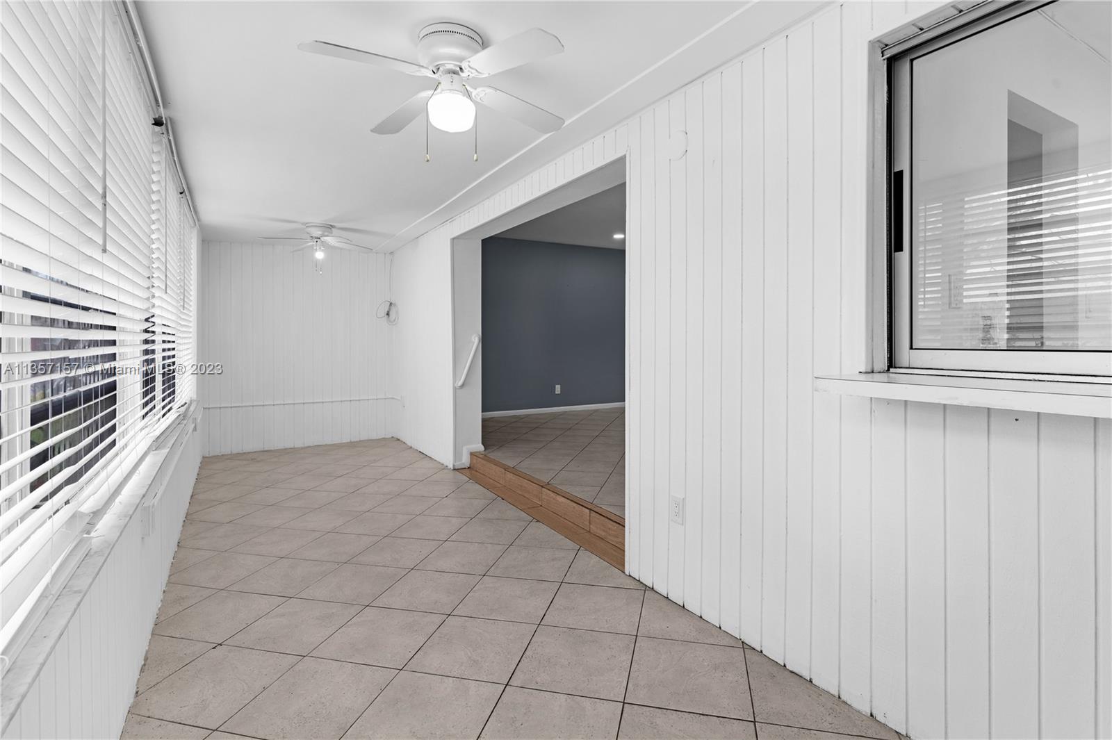 West Perrine Miami, FL 33157 - Photo 19 of 23 a view of a livingroom with a ceiling fan and window