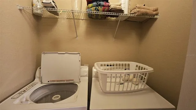 a utility room with a washer and dryer