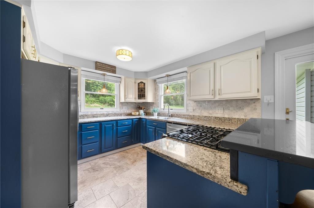 230 McWilliams Road Trafford, PA 15085 - Photo 13 of 50 Gas stove with built in air-fryer and middle griddle