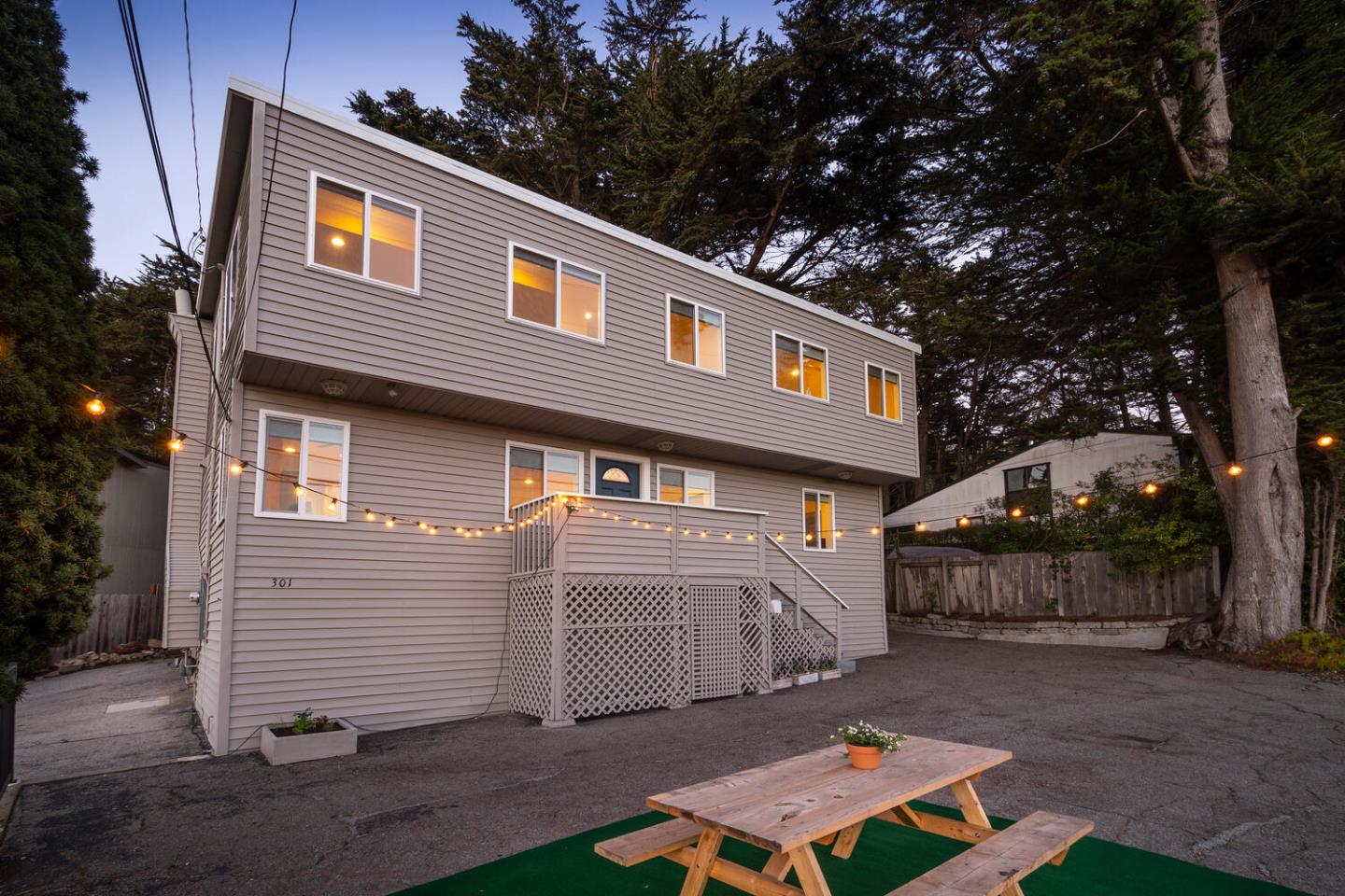 301 Channing Way Pacifica, CA 94044 - Photo 2 of 35 a front view of a house with a yard