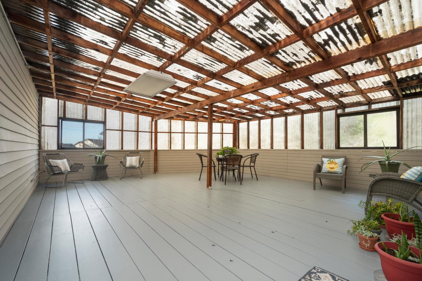301 Channing Way Pacifica, CA 94044 - Photo 21 of 35 a lobby with furniture and wooden floor