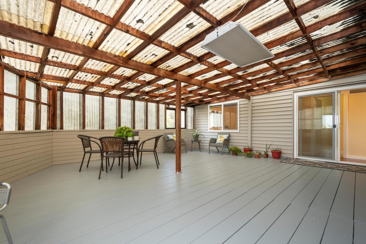 301 Channing Way Pacifica, CA 94044 - Photo 22 of 35 a view of a chairs and table in a patio