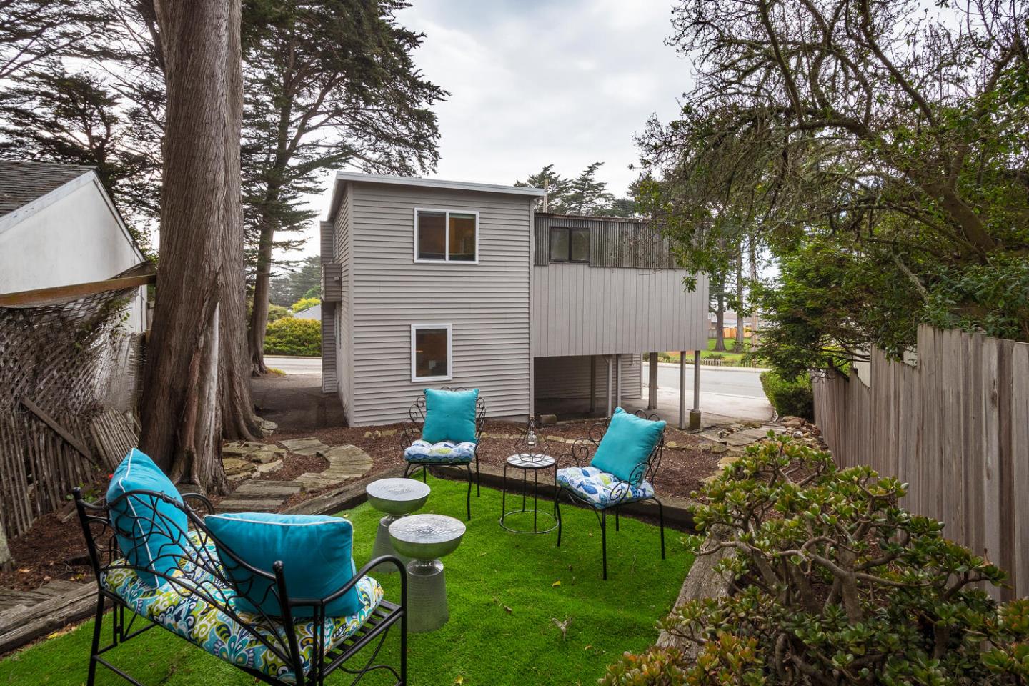 301 Channing Way Pacifica, CA 94044 - Photo 24 of 35 a view of backyard of house with seating space