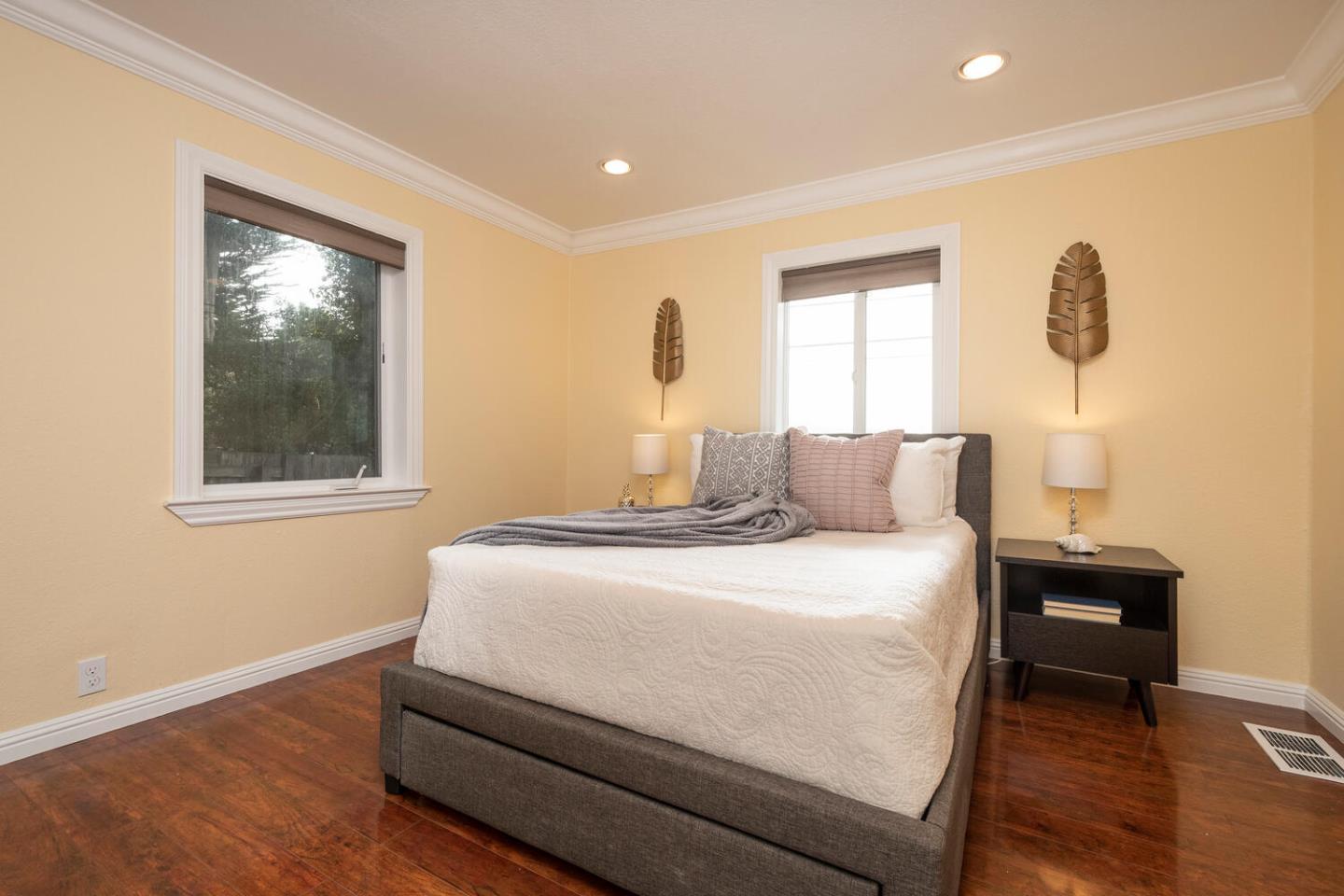 301 Channing Way Pacifica, CA 94044 - Photo 9 of 35 a bedroom with a bed and a window