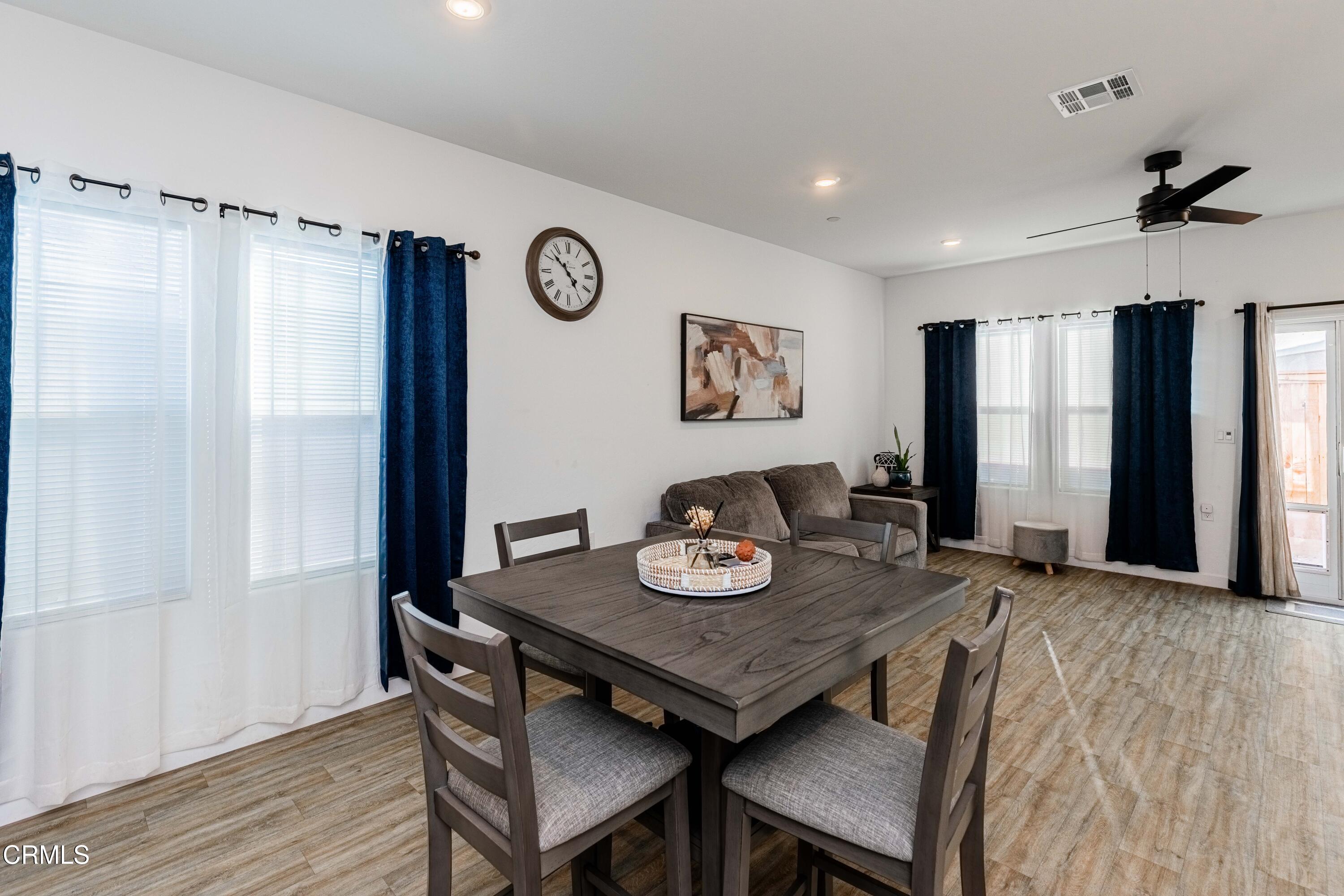 3305 Lilac View Shafter, CA 93263 - Photo 16 of 36 a view of a dining room with furniture and window