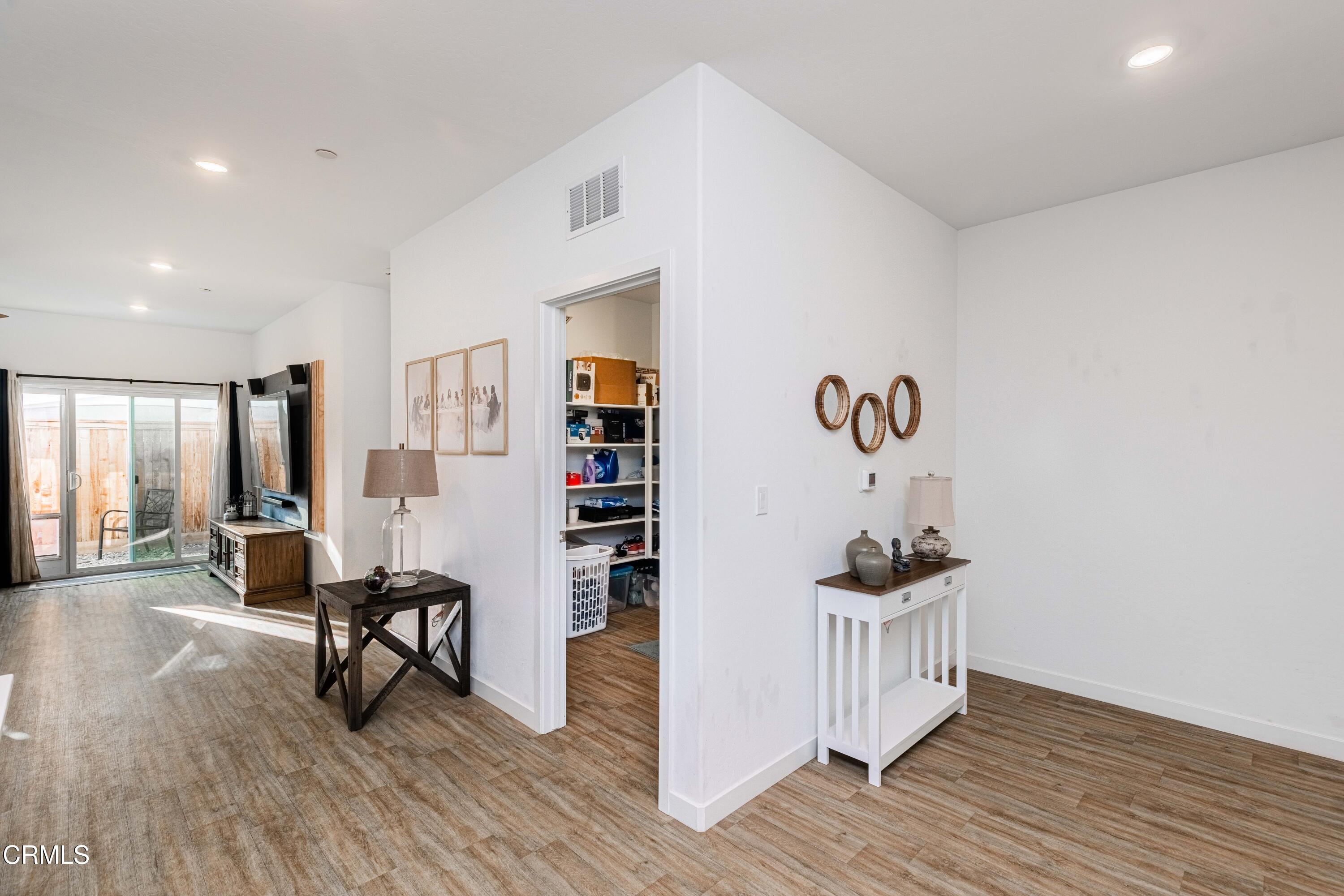 3305 Lilac View Shafter, CA 93263 - Photo 20 of 36 a view of a workspace with furniture and wooden floor