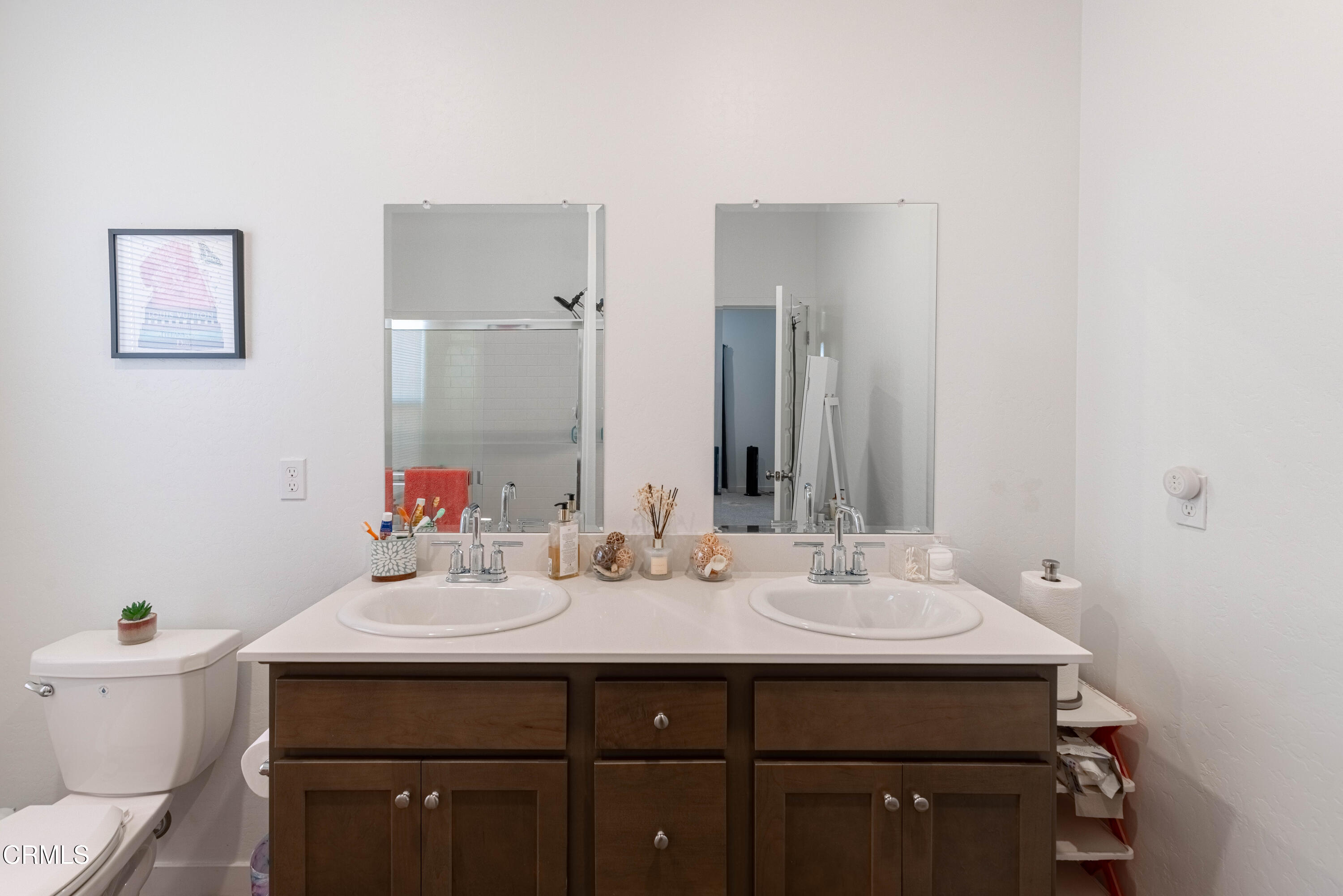 3305 Lilac View Shafter, CA 93263 - Photo 25 of 36 a bathroom with a sink and a mirror with toilet