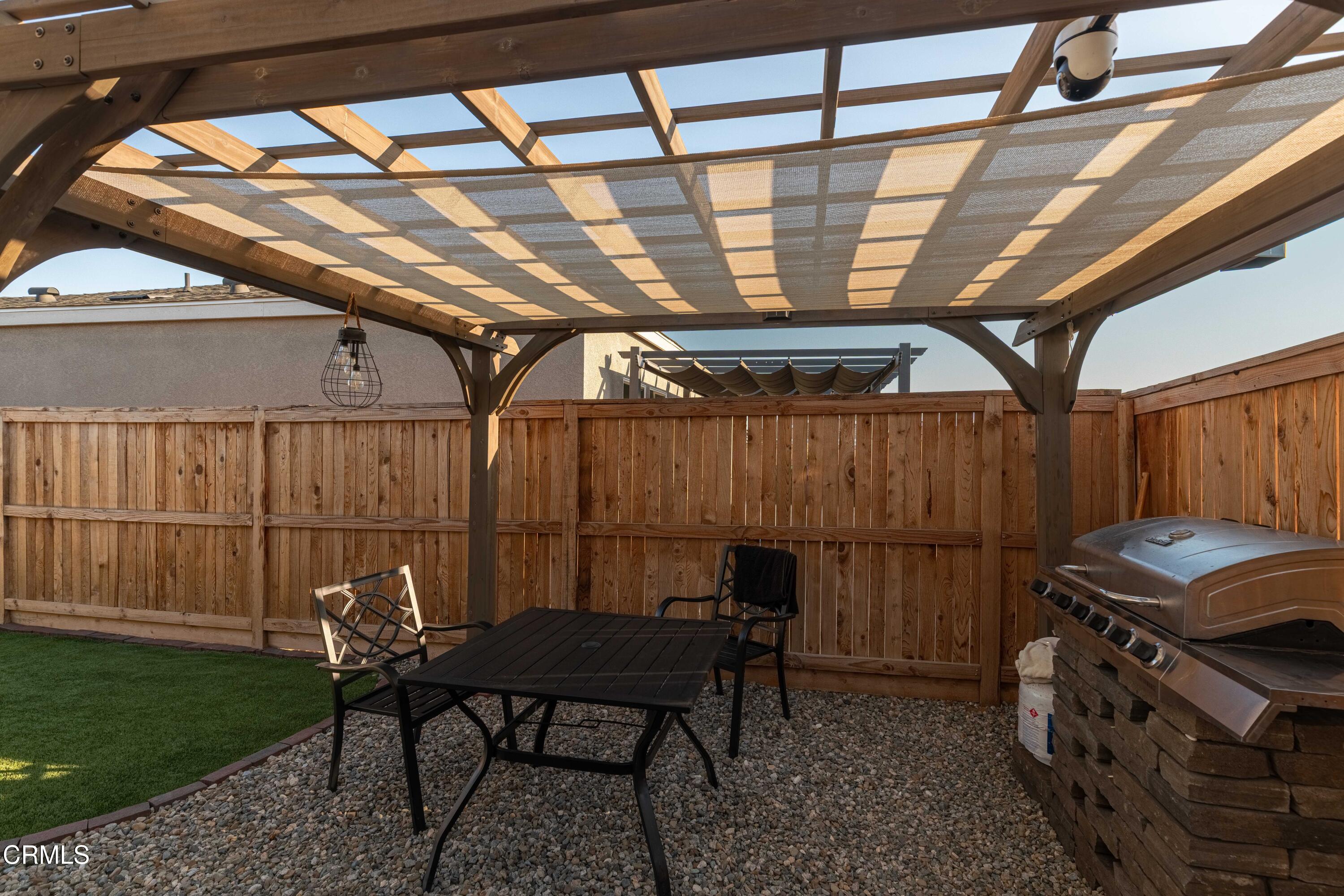 3305 Lilac View Shafter, CA 93263 - Photo 33 of 36 a view of a chairs and table in a patio