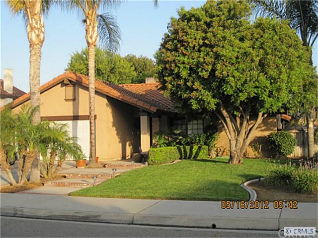 11508 Rancho Pocono Drive Riverside, CA 92505 - Photo 1 of 1 a view of a house with a yard and plants