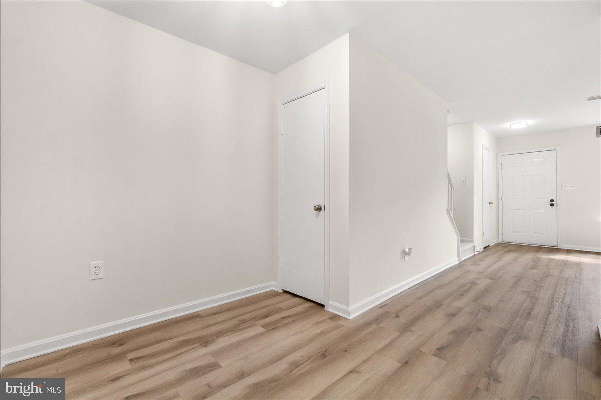 19742 Teakwood Circle, Unit 52 Germantown, MD 20874 - Photo 12 of 29 a view of a room with wooden floor