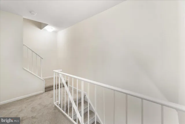 a view of entryway with stairs