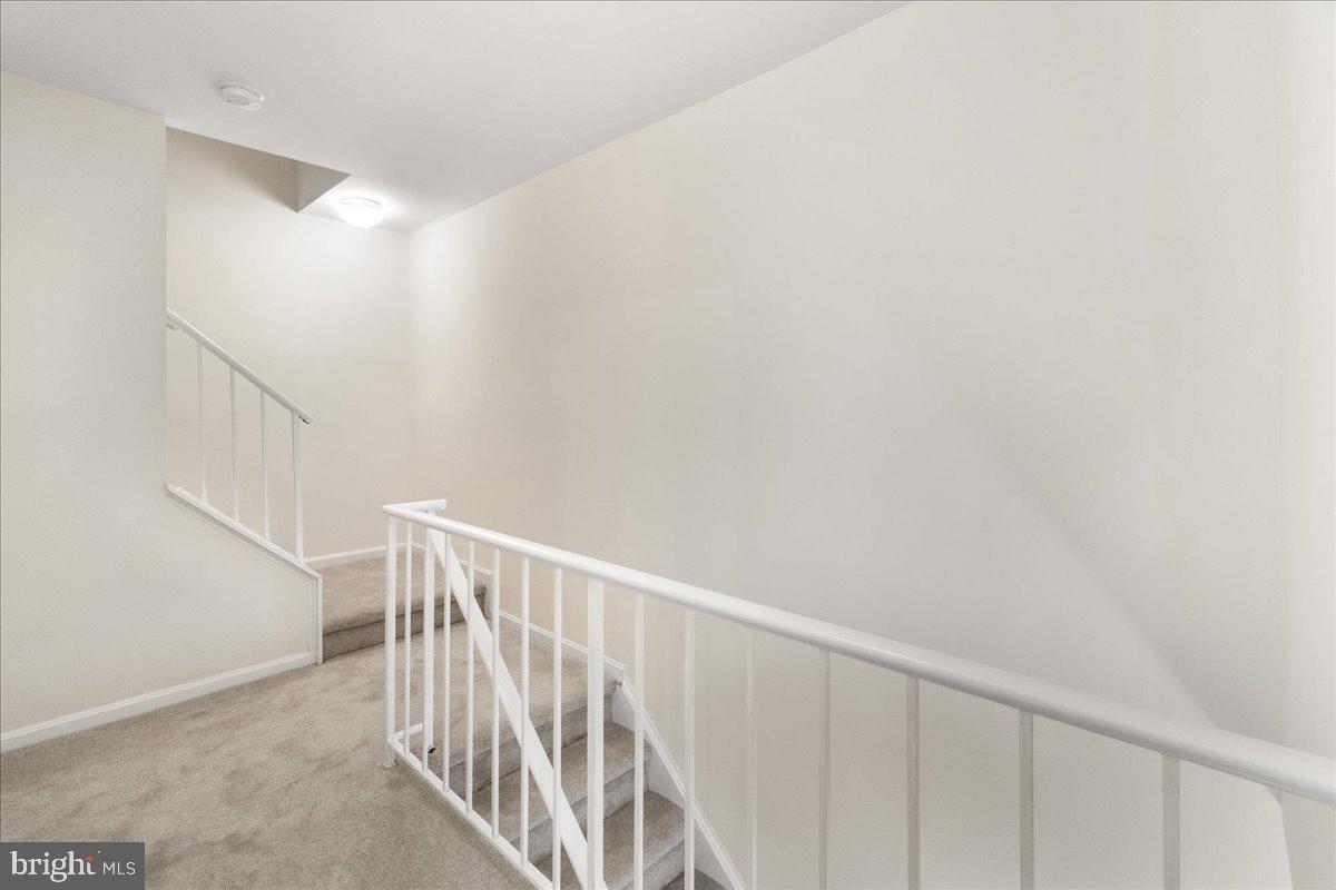 19742 Teakwood Circle, Unit 52 Germantown, MD 20874 - Photo 14 of 29 a view of entryway with stairs