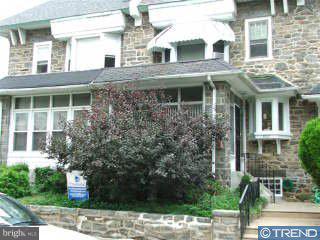 902 Marlyn Road Philadelphia, PA 19151 - Photo 1 of 6 a front view of a building with garden