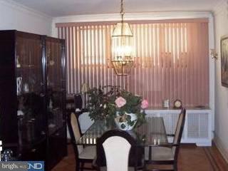 902 Marlyn Road Philadelphia, PA 19151 - Photo 3 of 6 a view of a dining room with furniture and chandelier