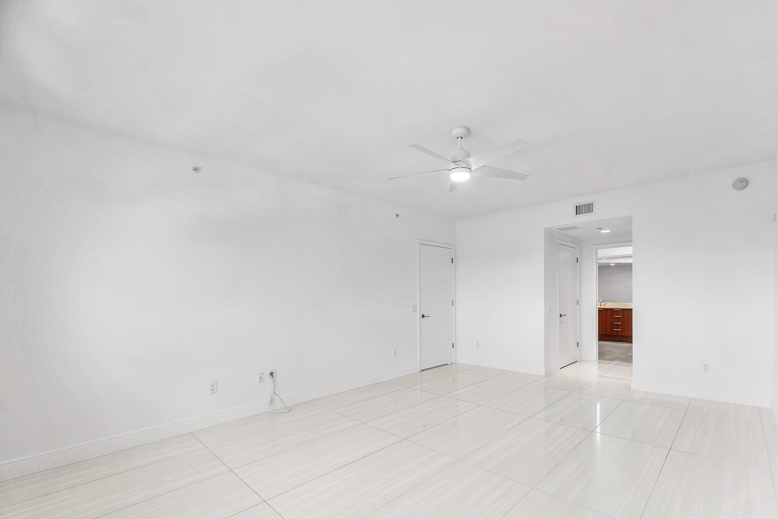 2650 Lake Shore Drive, Unit 1005 Riviera Beach, FL 33404 - Photo 11 of 52 Primary Bedroom