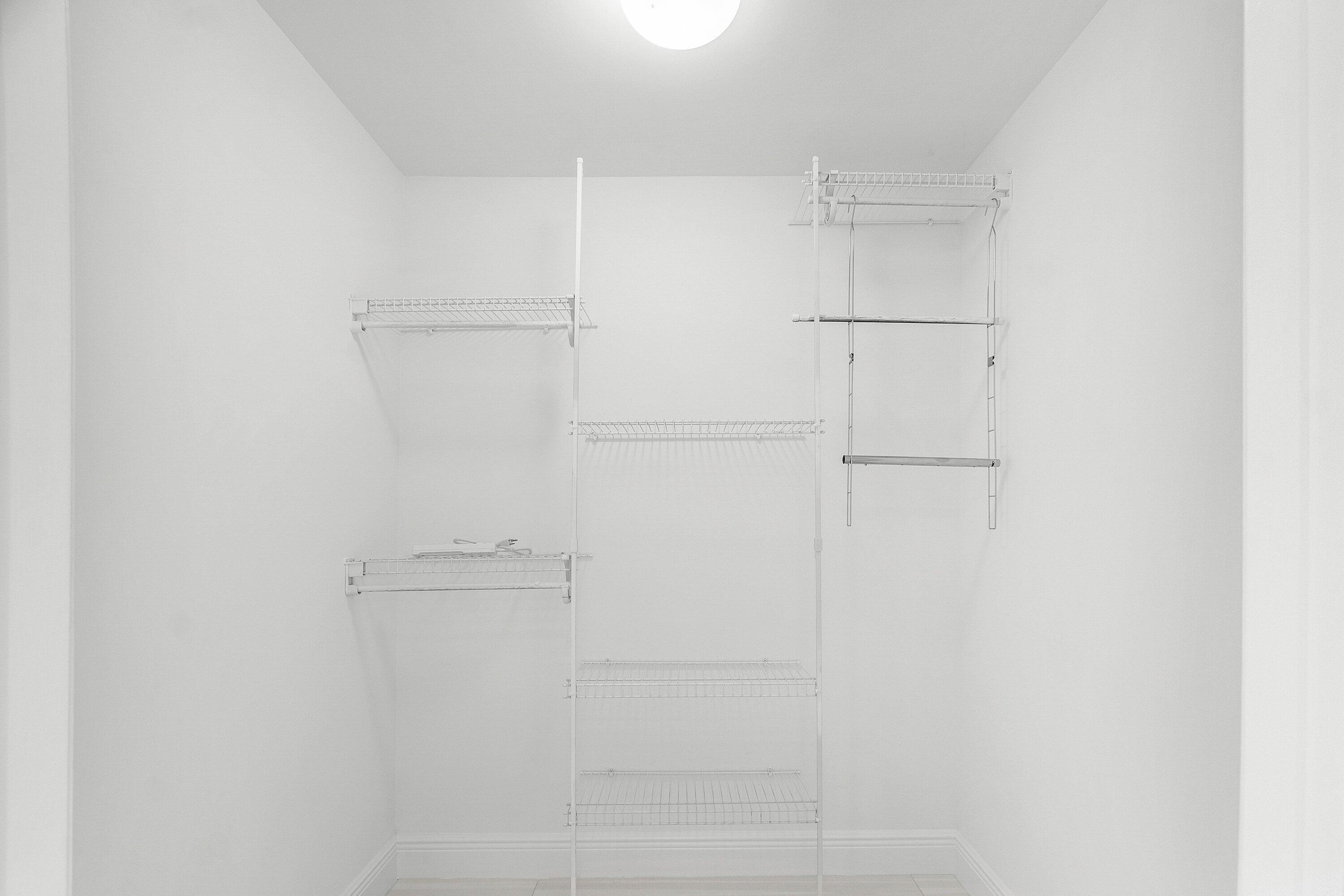 2650 Lake Shore Drive, Unit 1005 Riviera Beach, FL 33404 - Photo 16 of 52 Her Walk-In Closet