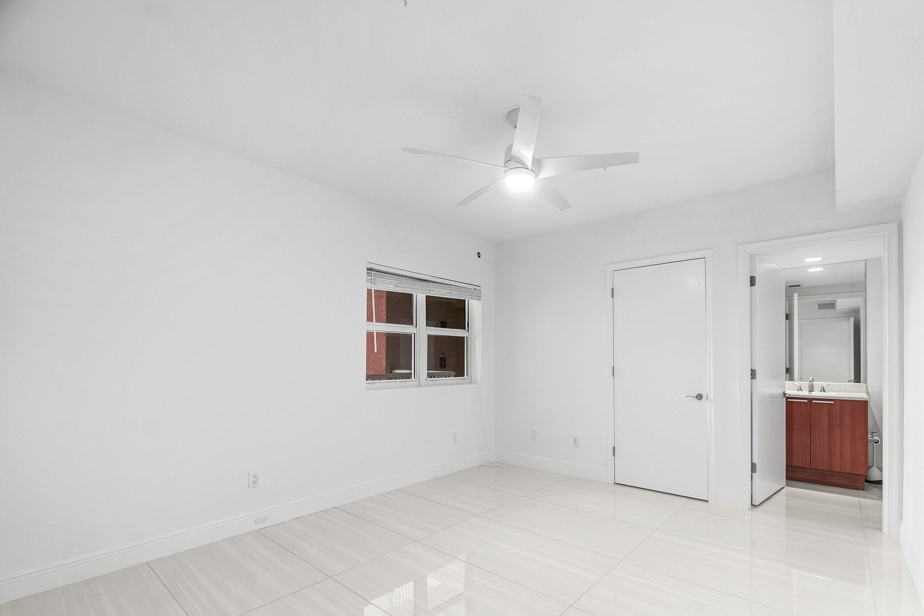 2650 Lake Shore Drive, Unit 1005 Riviera Beach, FL 33404 - Photo 17 of 52 Guest Bedroom
