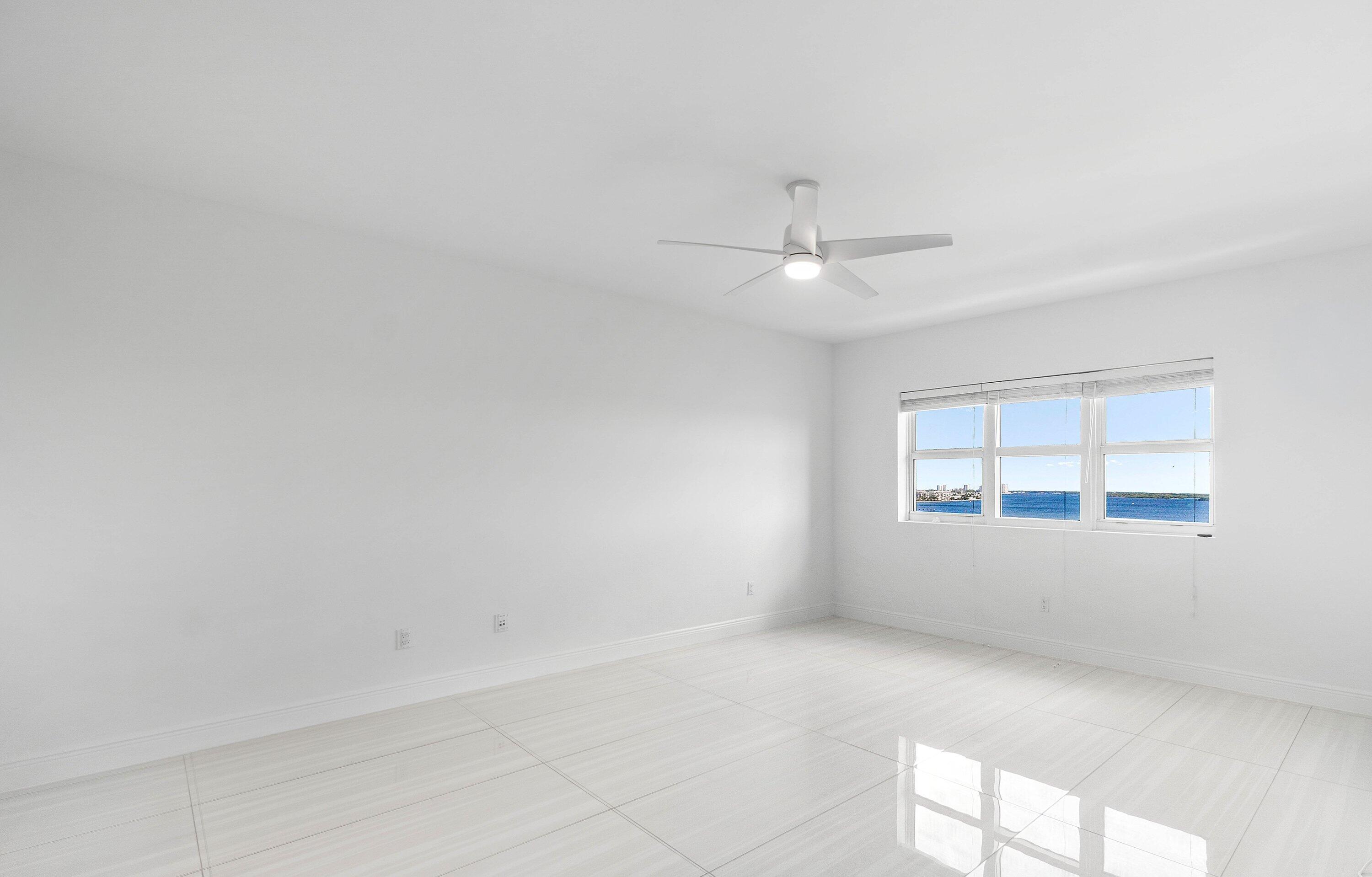 2650 Lake Shore Drive, Unit 1005 Riviera Beach, FL 33404 - Photo 9 of 52 Primary Bedroom