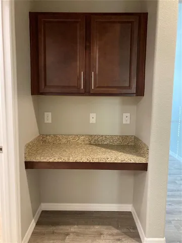 a view of wooden cabinets