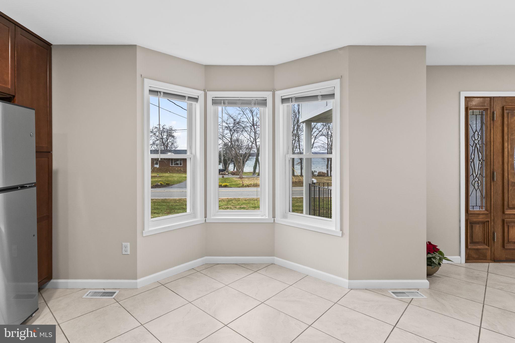 25001 Half Pone Point Road Hollywood, MD 20636 - Photo 16 of 40 a view of an empty room with a window