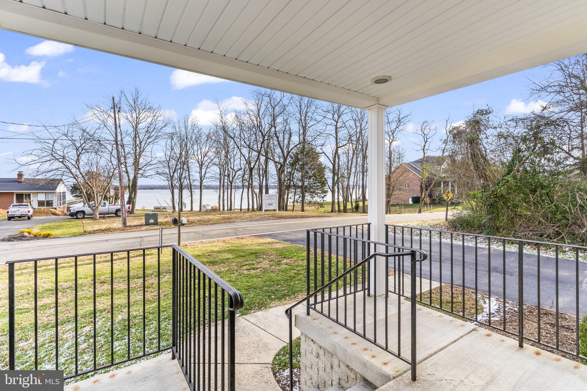 25001 Half Pone Point Road Hollywood, MD 20636 - Photo 6 of 40 a view of staircase with a swimming pool