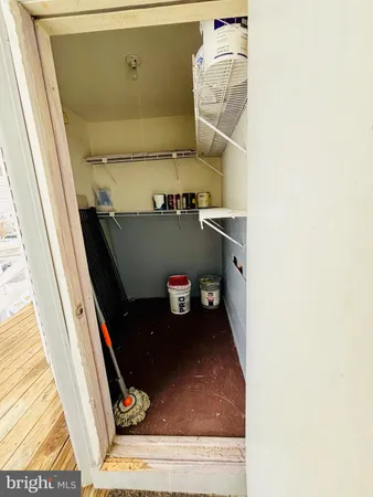 wooden floor in a hall with an entryway