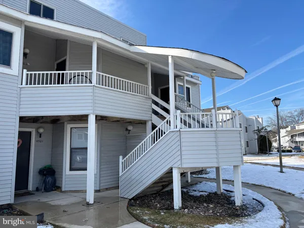 a front view of a house with a balcony