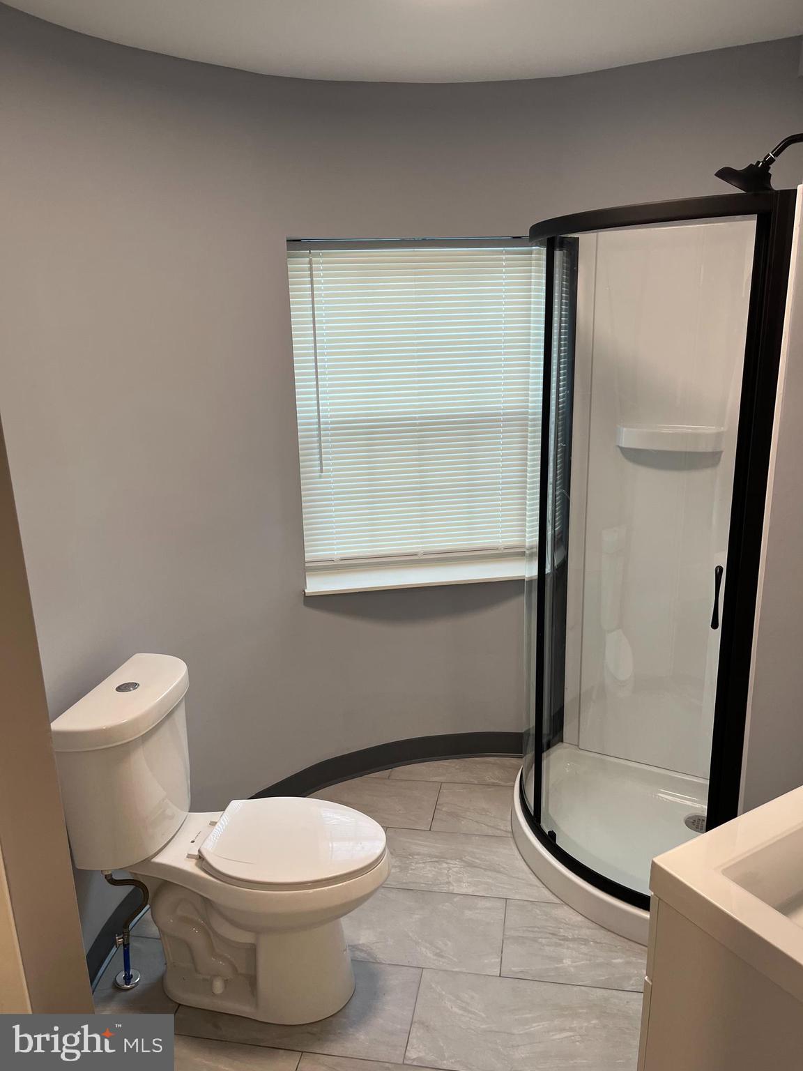 44 East Court Street Doylestown, PA 18901 - Photo 11 of 12 a bathroom with a toilet and a shower