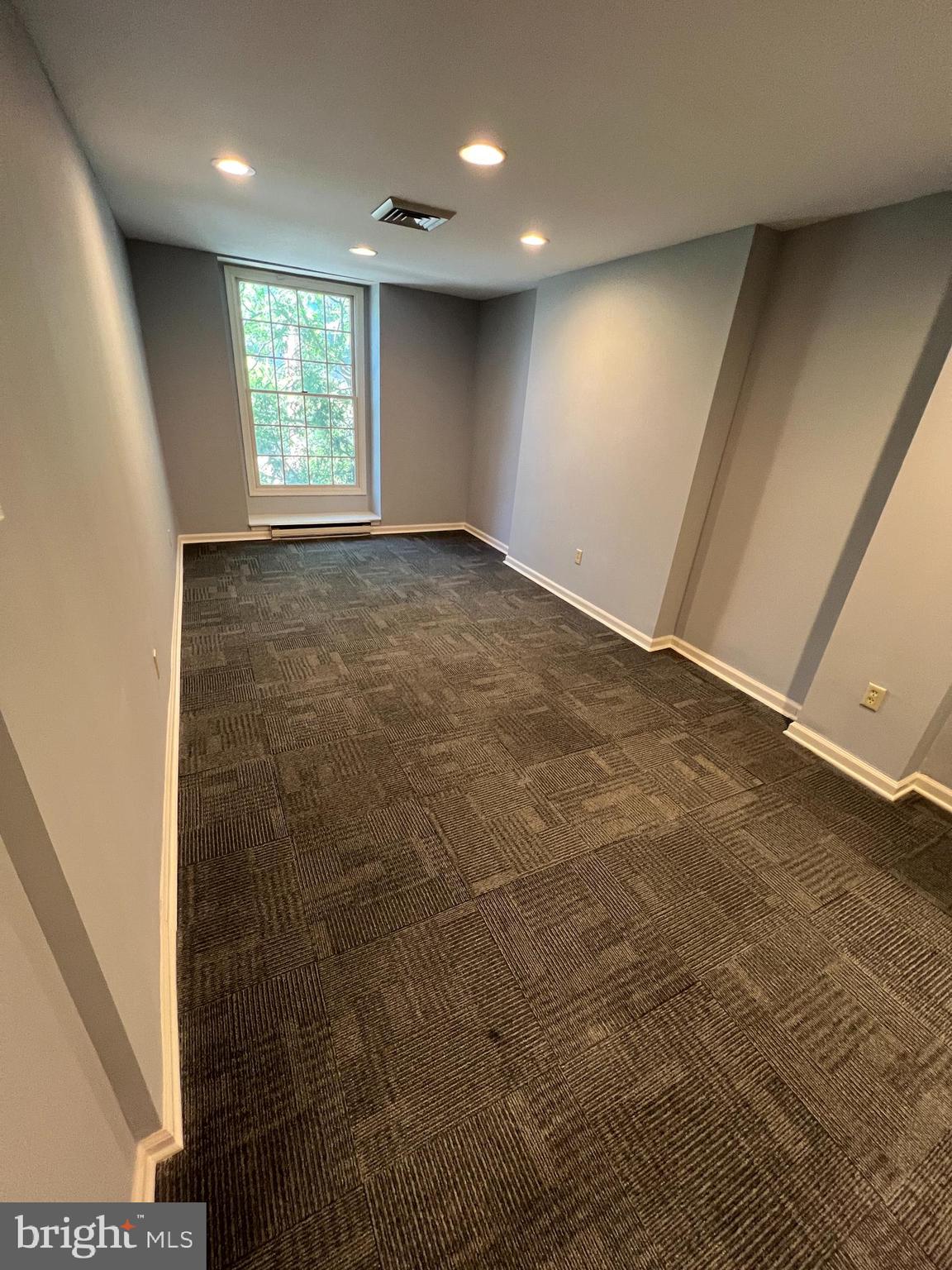 44 East Court Street Doylestown, PA 18901 - Photo 5 of 12 a view of an empty room with a window