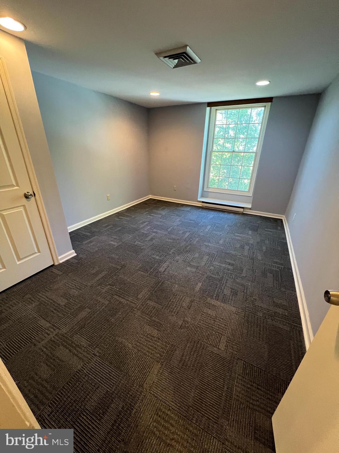 44 East Court Street Doylestown, PA 18901 - Photo 8 of 12 a view of an empty room with a window