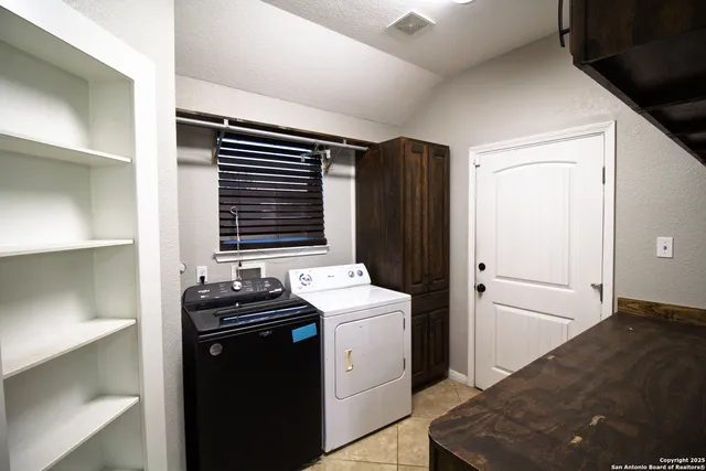 a room with storage and utility